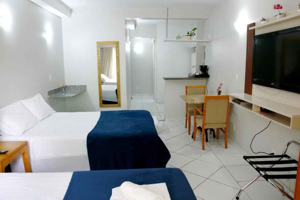 Postel nebo postele na pokoji v ubytování Flats em frente ao Allianz Parque - HOTEL EM PERDIZES