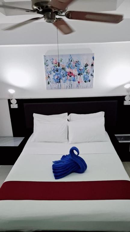 Postel nebo postele na pokoji v ubytování Boomerang Inn