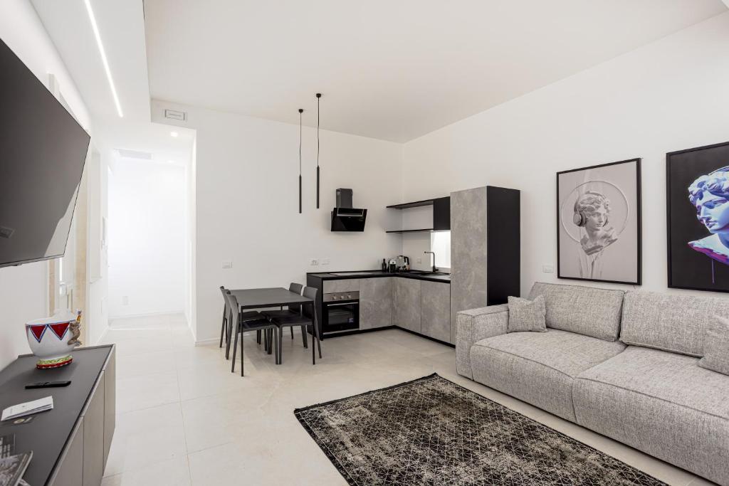 Kuchyň nebo kuchyňský kout v ubytování Nostos rooms & Apartments