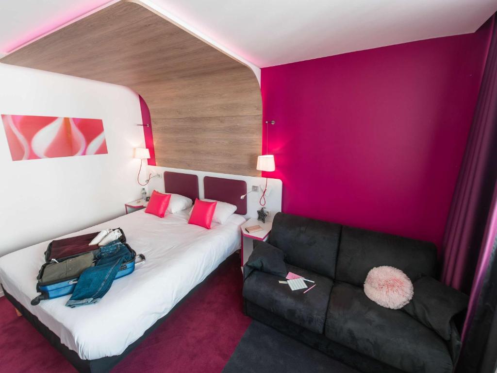 Postel nebo postele na pokoji v ubytování ibis Styles Montelimar Centre