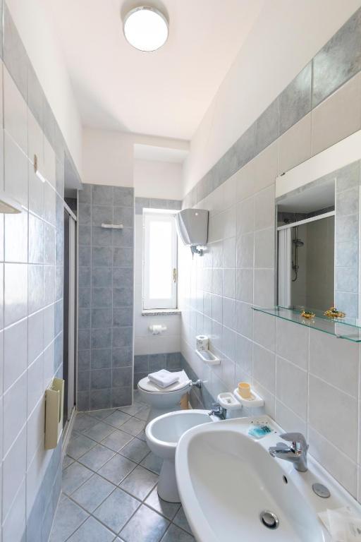 Koupelna v ubytování Hotel Calabrisella