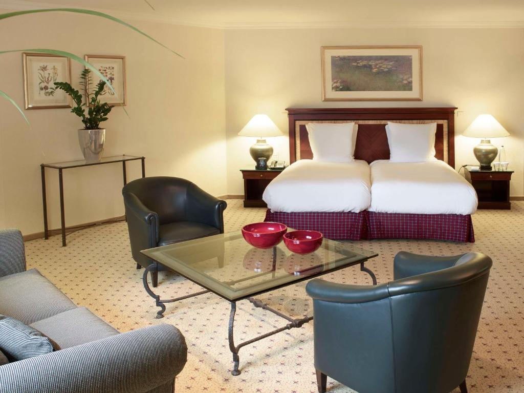 Postel nebo postele na pokoji v ubytování Hilton Antwerp Old Town