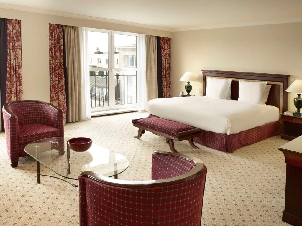 Postel nebo postele na pokoji v ubytování Hilton Antwerp Old Town
