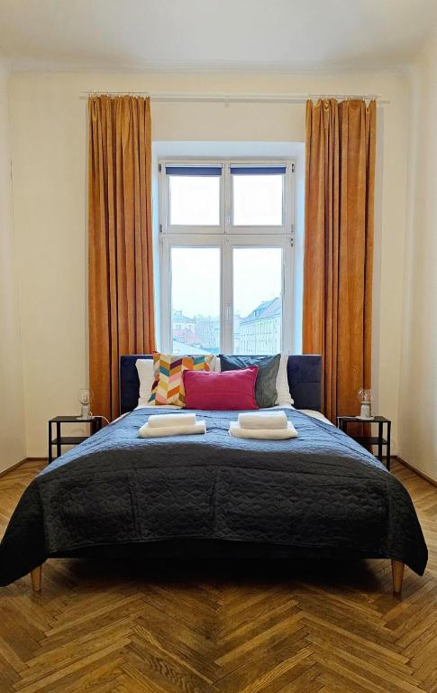 Posteľ alebo postele v izbe v ubytovaní Vilao Apartments