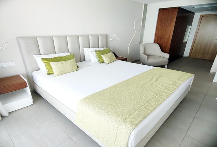Postel nebo postele na pokoji v ubytování Luna Boutique Hotel