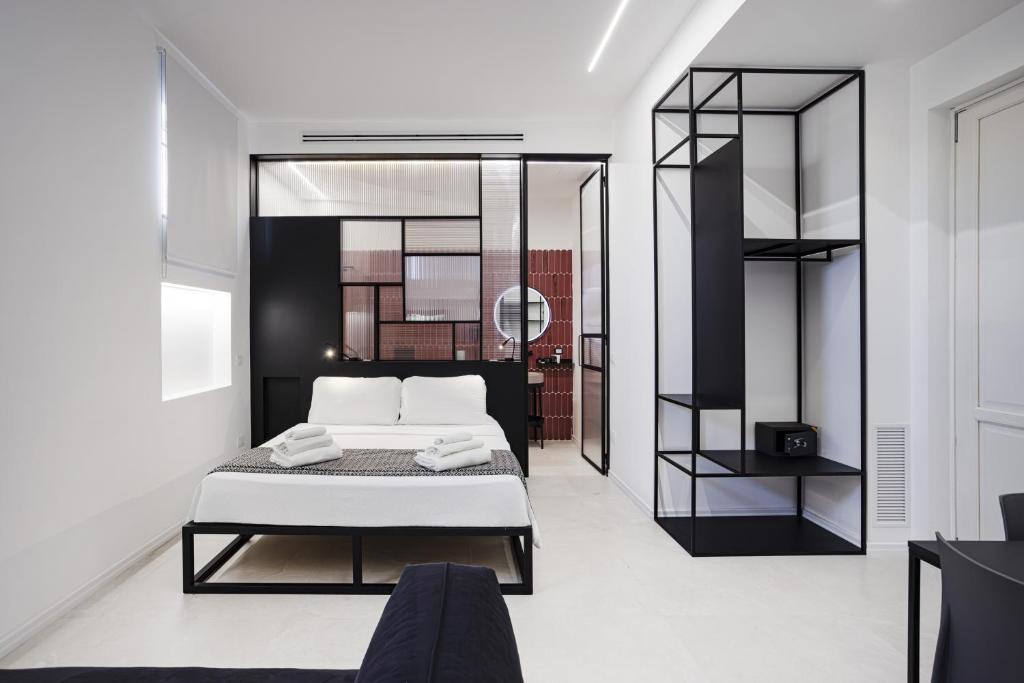 Postel nebo postele na pokoji v ubytování Nostos rooms & Apartments