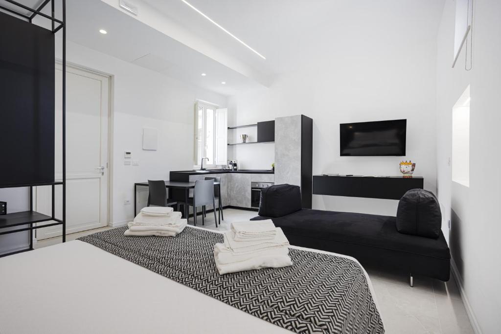 TV a/nebo společenská místnost v ubytování Nostos rooms & Apartments