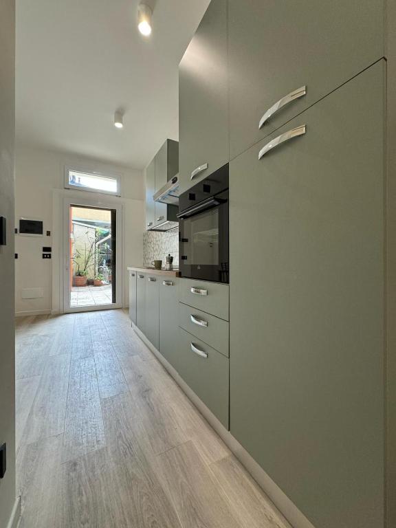 Kuchyň nebo kuchyňský kout v ubytování Casa Naviglio Charm