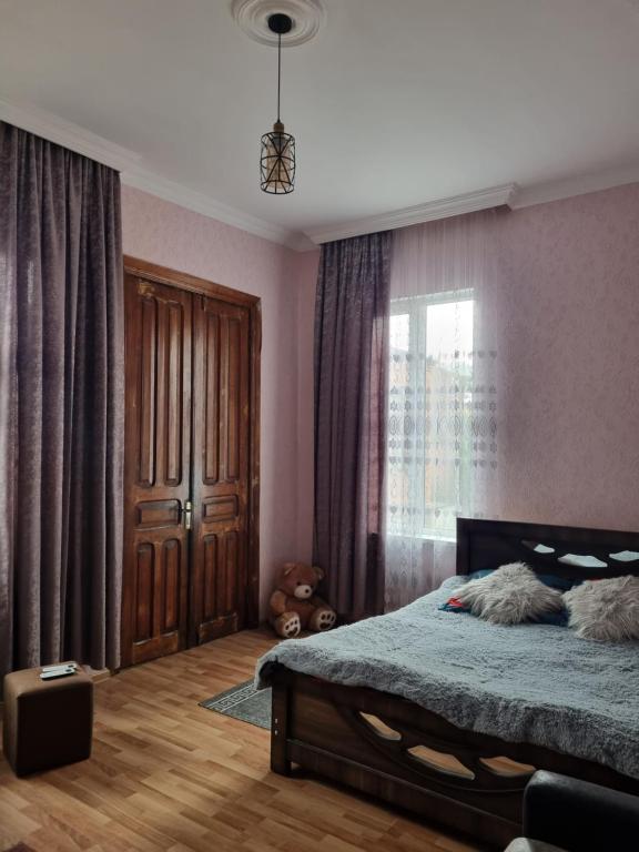 Postel nebo postele na pokoji v ubytování Latvji