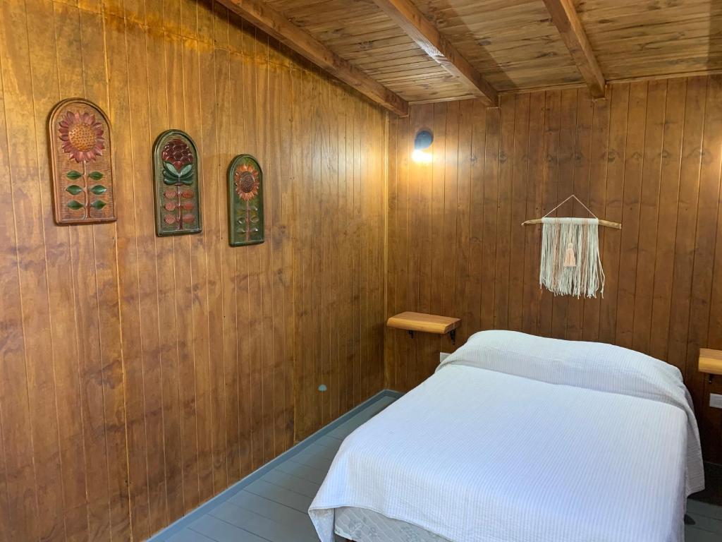Postel nebo postele na pokoji v ubytování Refugio Ventana