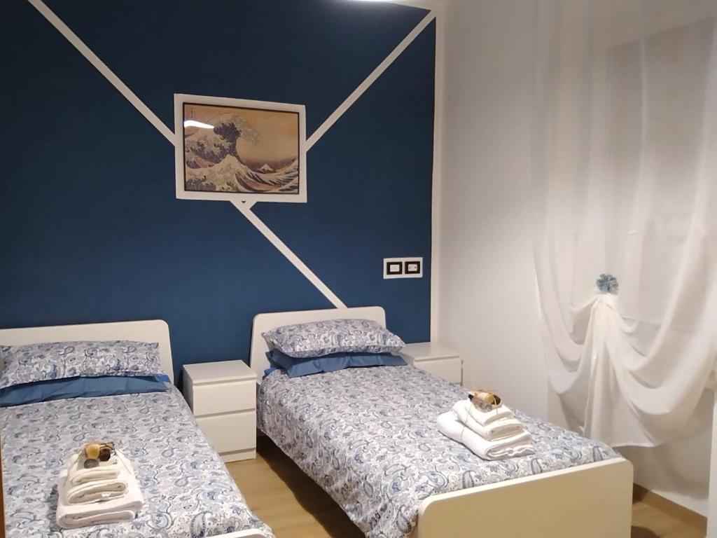 Ένα ή περισσότερα κρεβάτια σε δωμάτιο στο Urban Chic Apartament
