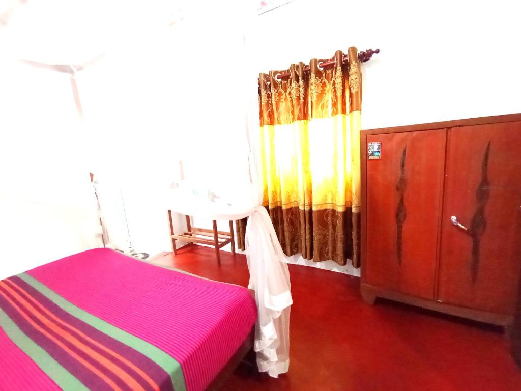 Postel nebo postele na pokoji v ubytování Sasaa Guest House