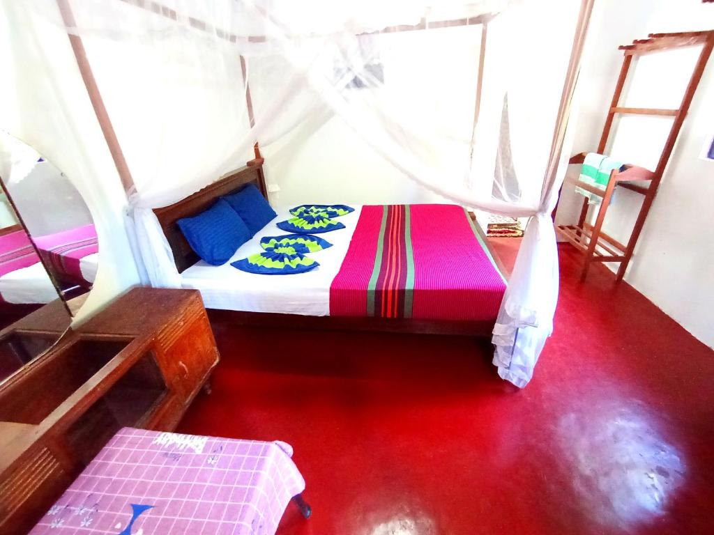 Postel nebo postele na pokoji v ubytování Sasaa Guest House
