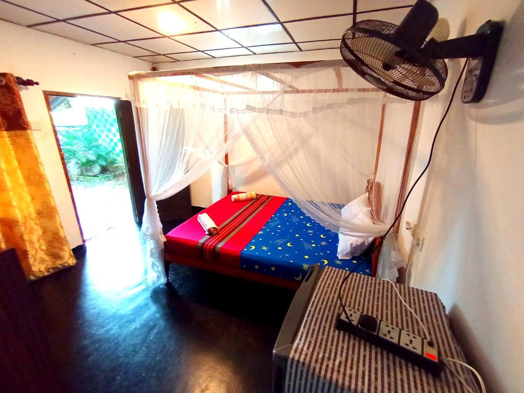Postel nebo postele na pokoji v ubytování Sasaa Guest House