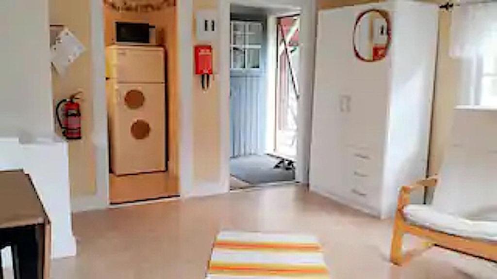 Posezení v ubytování LillStugan på Örsgänge Delsbo