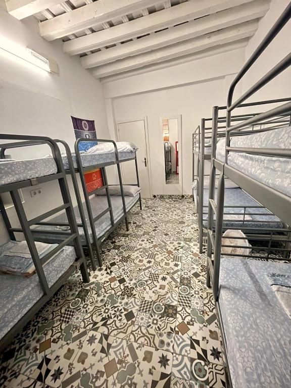 Postel nebo postele na pokoji v ubytování Rosa de los Vientos