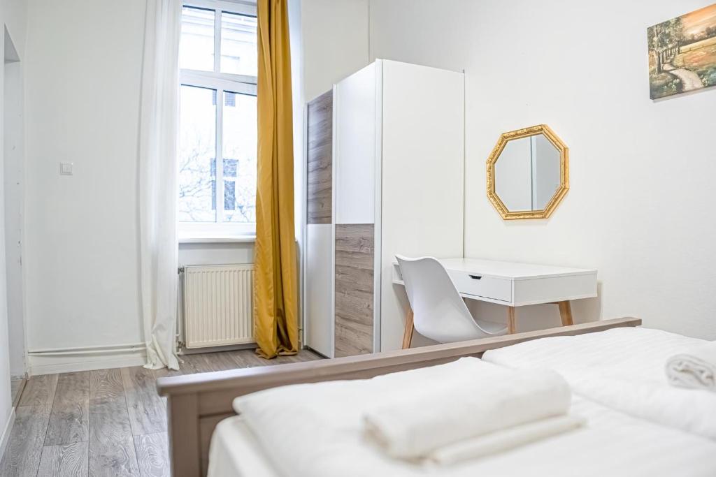 Łóżko lub łóżka w pokoju w obiekcie Delightful 2BR Apt.-Near Wiener Stadthalle