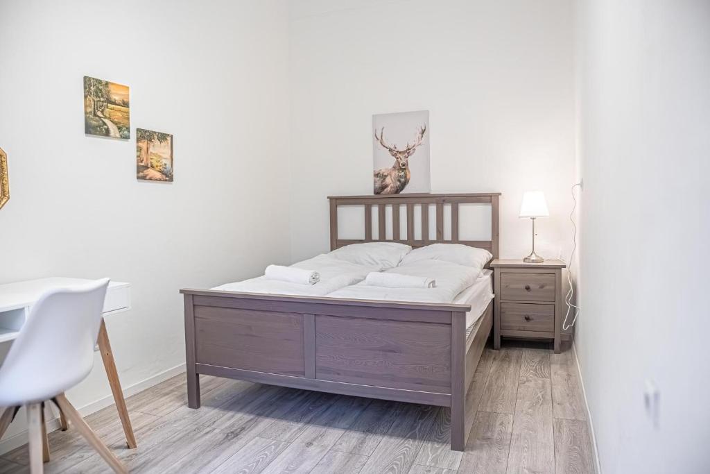 Łóżko lub łóżka w pokoju w obiekcie Delightful 2BR Apt.-Near Wiener Stadthalle