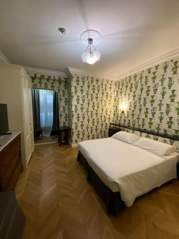 Postel nebo postele na pokoji v ubytování Boutique Hotel Anahi