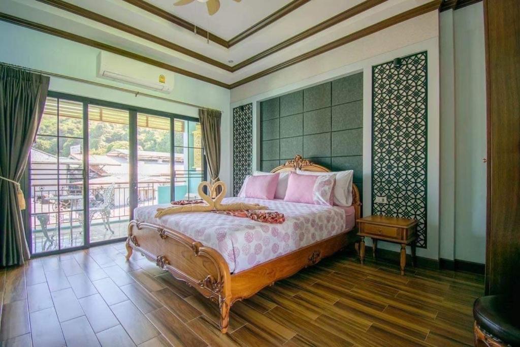 Letto o letti in una camera di TC villa on beach