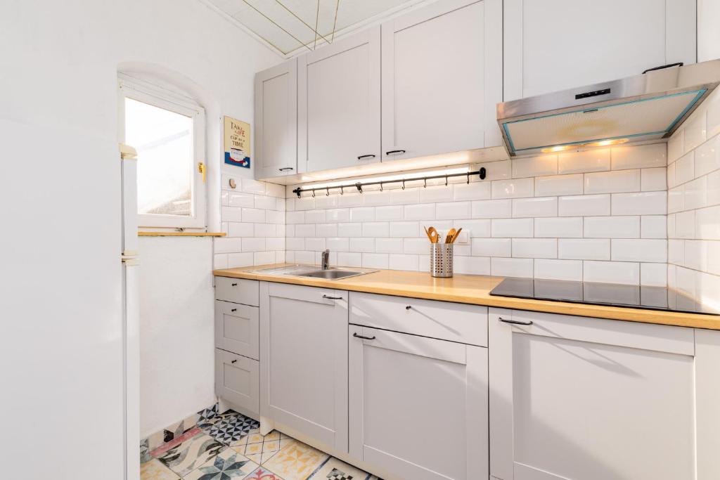 Kuchyň nebo kuchyňský kout v ubytování Apartment Iskra by El-Pi Tours