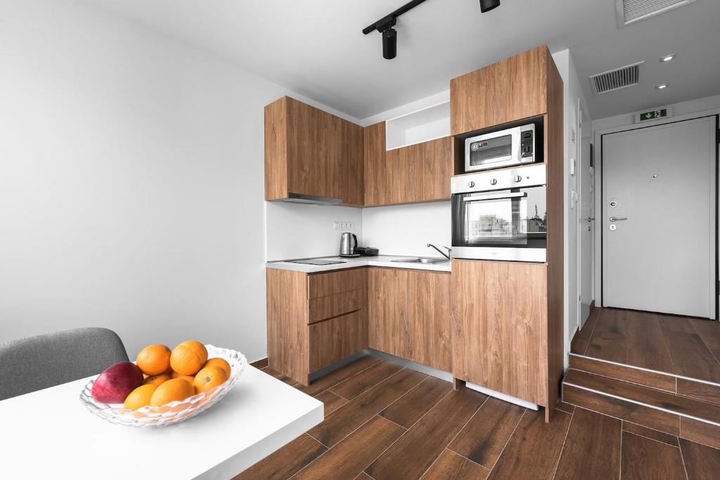 Kuchyňa alebo kuchynka v ubytovaní Ultima, Nilie Hospitality MGMT