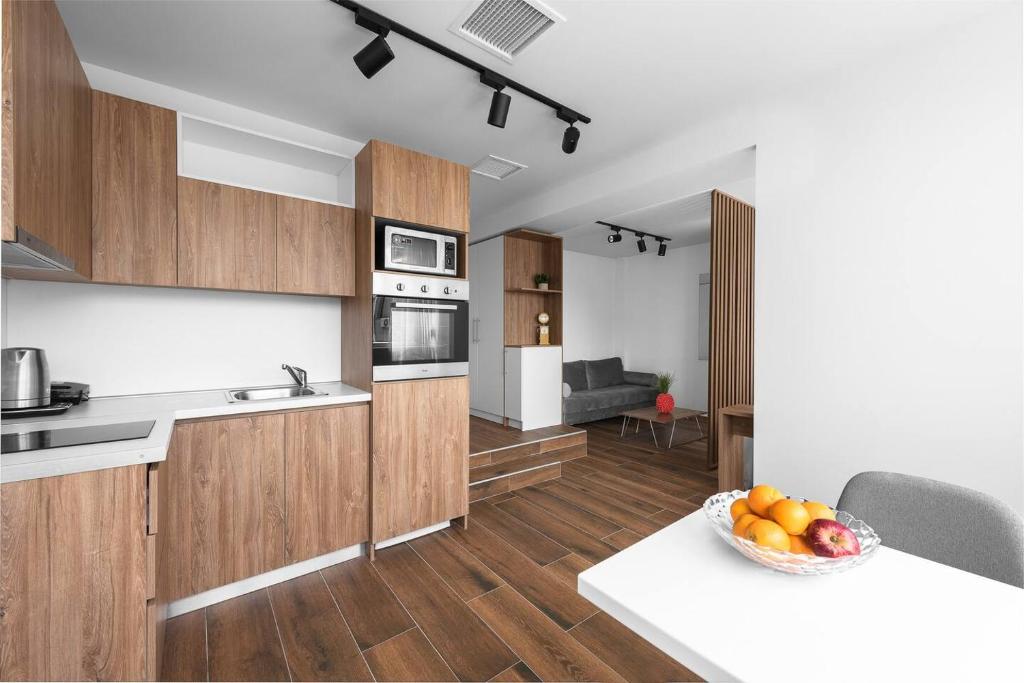 Kuchyňa alebo kuchynka v ubytovaní Ultima, Nilie Hospitality MGMT
