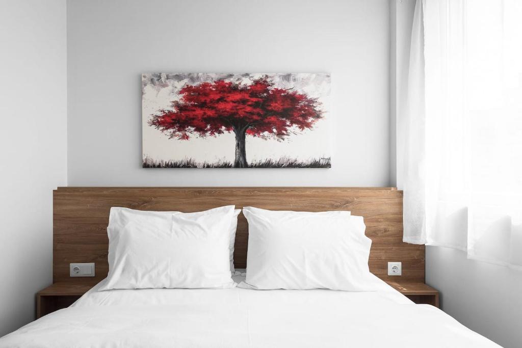 Posteľ alebo postele v izbe v ubytovaní Ultima, Nilie Hospitality MGMT