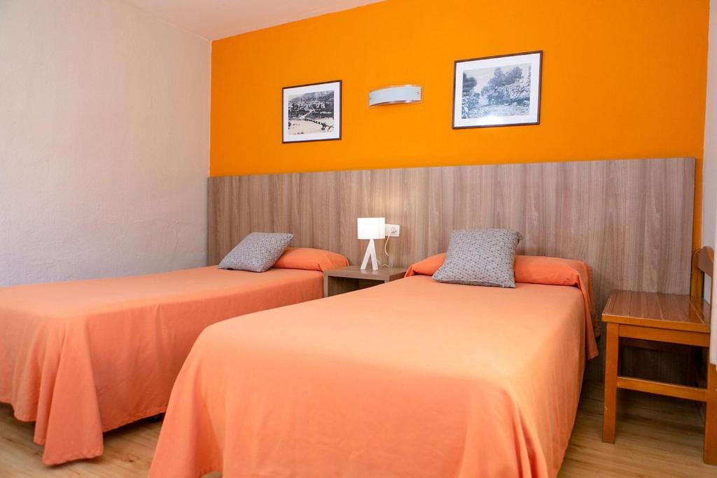 Postel nebo postele na pokoji v ubytování Hotel Snö Condes del Pallars