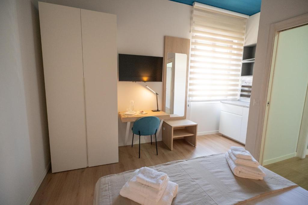 Postel nebo postele na pokoji v ubytování Letizia B&B