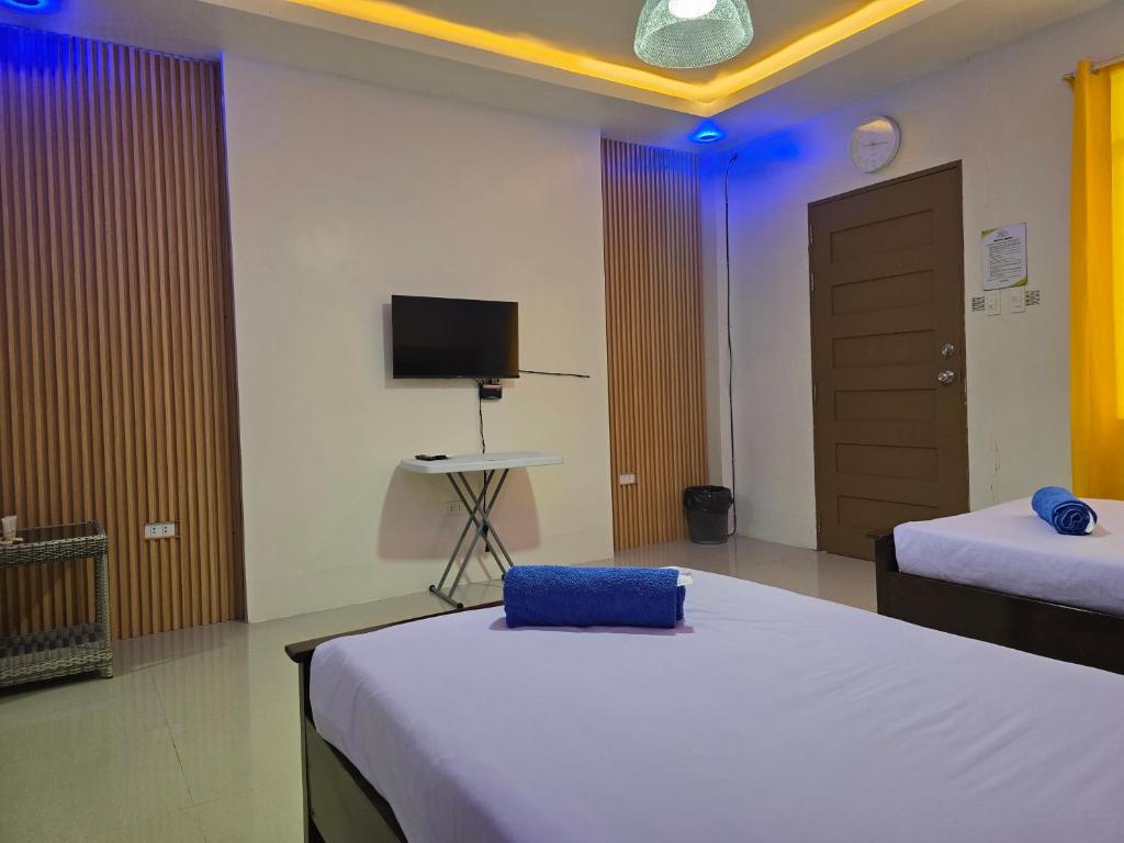 Postel nebo postele na pokoji v ubytování JADE RESORT - Bauang, La Union