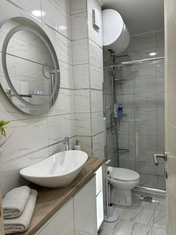 Kopalnica v nastanitvi Stan na dan Golden apartman