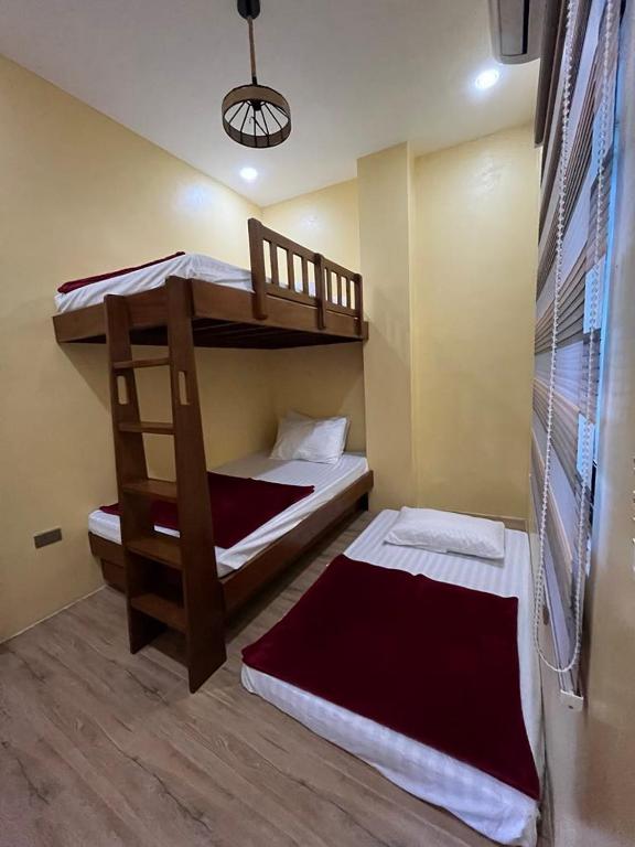 Postel nebo postele na pokoji v ubytování Lisro Sleep and Relax