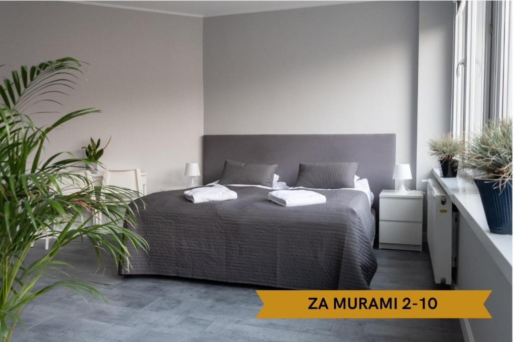 Posteľ alebo postele v izbe v ubytovaní Lunette Apartments