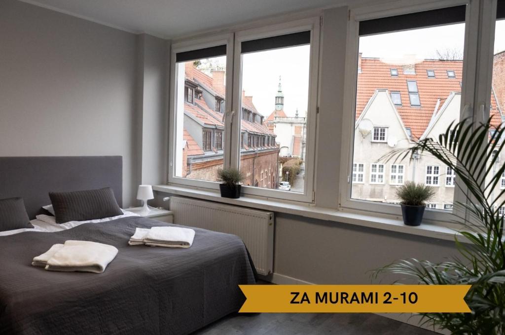 Posteľ alebo postele v izbe v ubytovaní Lunette Apartments