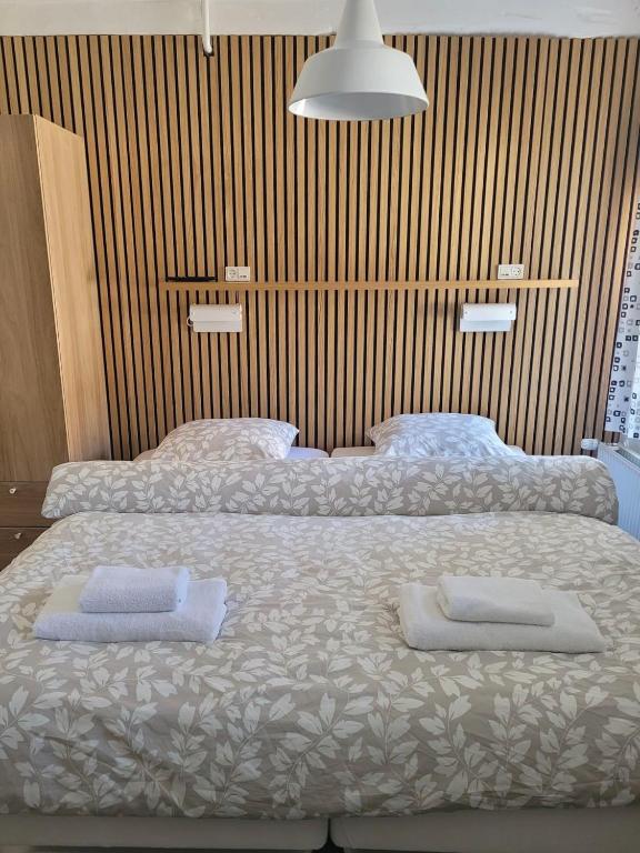 Postel nebo postele na pokoji v ubytování Bjerremark Hotel og Kursuscenter