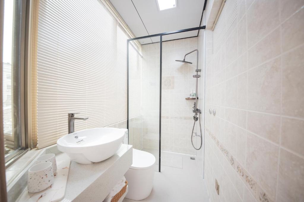 Koupelna v ubytování Meizhou Island Lijia Xiaoyuan B&B