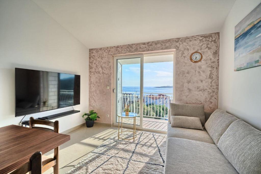 Televízia a/alebo spoločenská miestnosť v ubytovaní Apartment AnteV