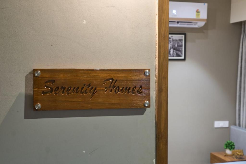 Certifikát, hodnocení, plakát nebo jiný dokument vystavený v ubytování Serenity Homes Kolhapur