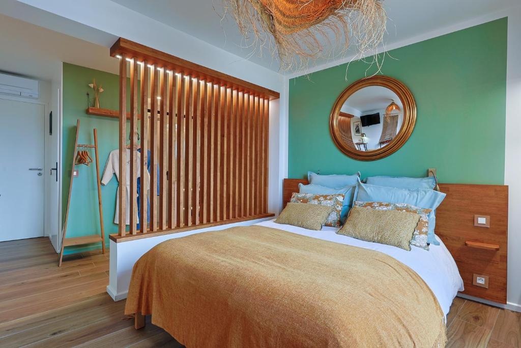 Postel nebo postele na pokoji v ubytování chambre d'hote luxe vue mer boheme