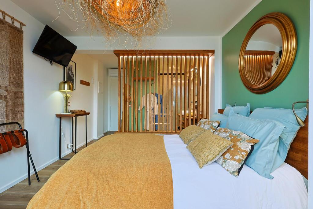 Postel nebo postele na pokoji v ubytování chambre d'hote luxe vue mer boheme