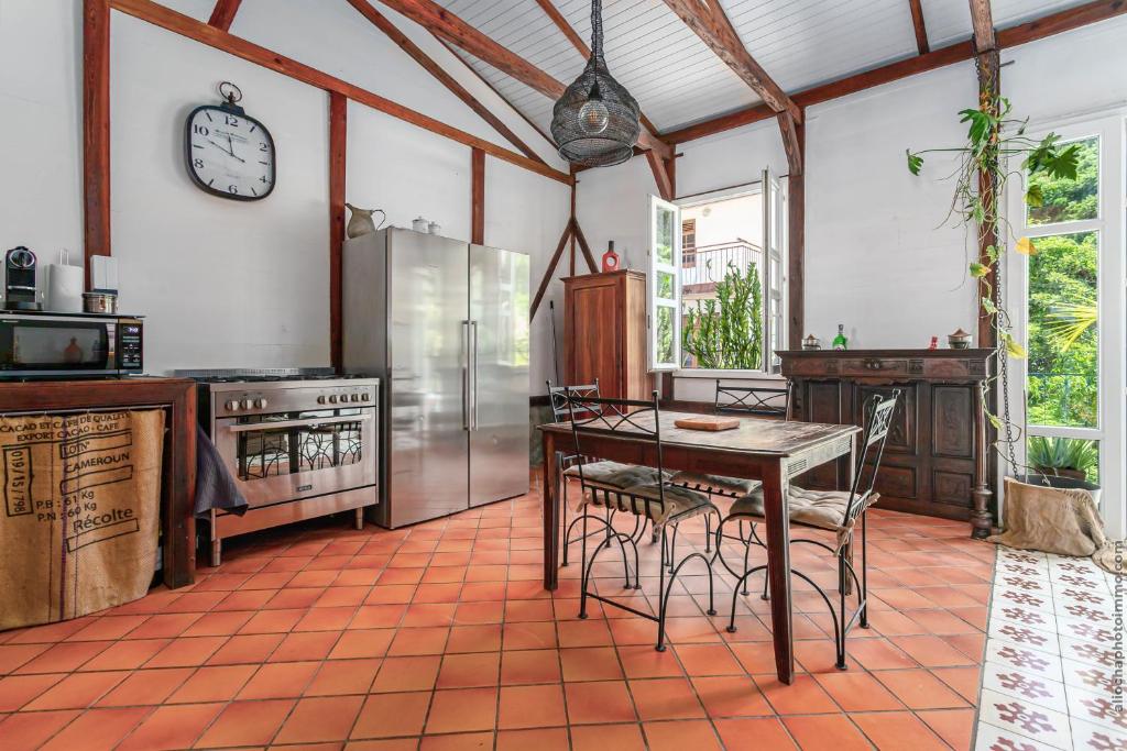 Kuchyň nebo kuchyňský kout v ubytování Maison Manman Dlo