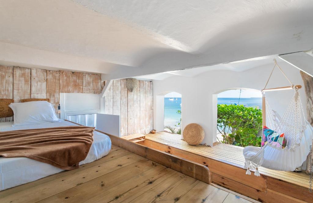 Postel nebo postele na pokoji v ubytování Maison Manman Dlo
