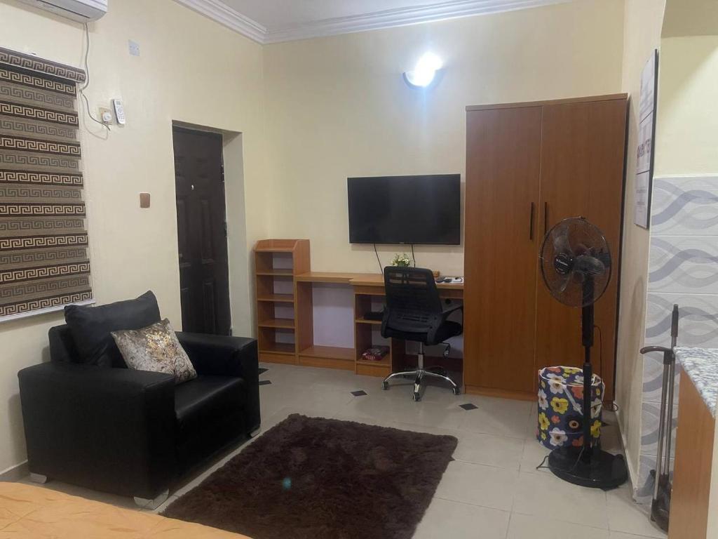 TV a/nebo společenská místnost v ubytování Rehoboth Homes
