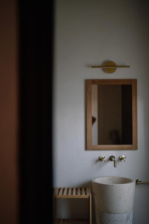 Koupelna v ubytování Taga Suites