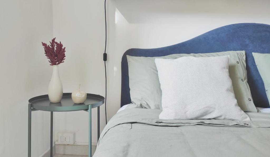 Posteľ alebo postele v izbe v ubytovaní Conte Verde Apartments