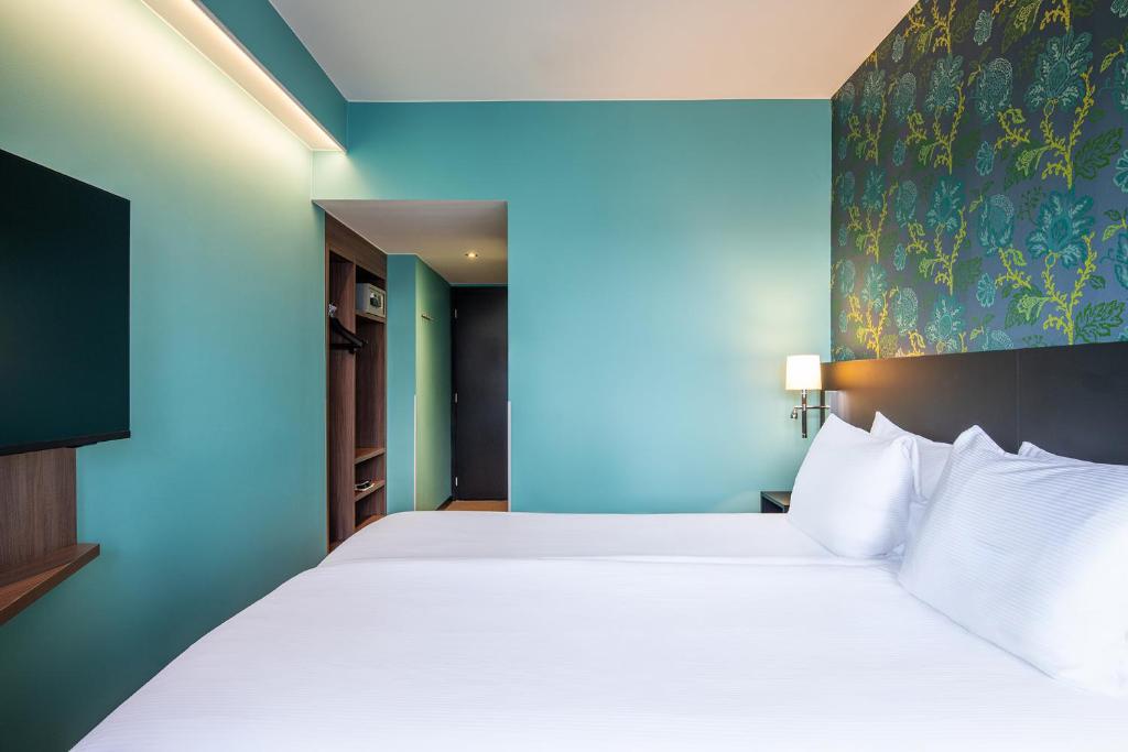 Postel nebo postele na pokoji v ubytování Thon Hotel Brussels City Centre