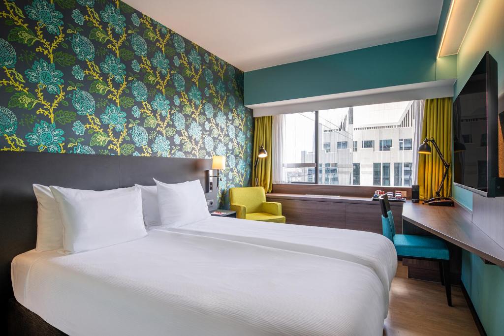 Postel nebo postele na pokoji v ubytování Thon Hotel Brussels City Centre
