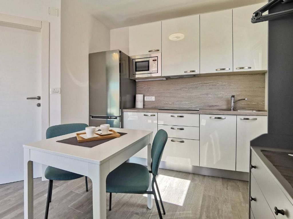 Kuchyň nebo kuchyňský kout v ubytování Studio Apartment Glorijeta