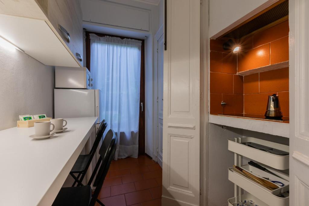 Kuchyňa alebo kuchynka v ubytovaní Spazioso appartamento nei pressi del Po by Wonderful Italy